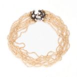 NO RESERVE - AN ANTIQUE PEARL AND DIAMOND CHOKER NECKLACE in yellow gold and silver, comprising t...
