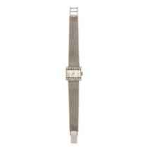 TISSOT, A DIAMOND WRISTWATCH in 18ct white gold, the rectangular face with applied baton hour mar...