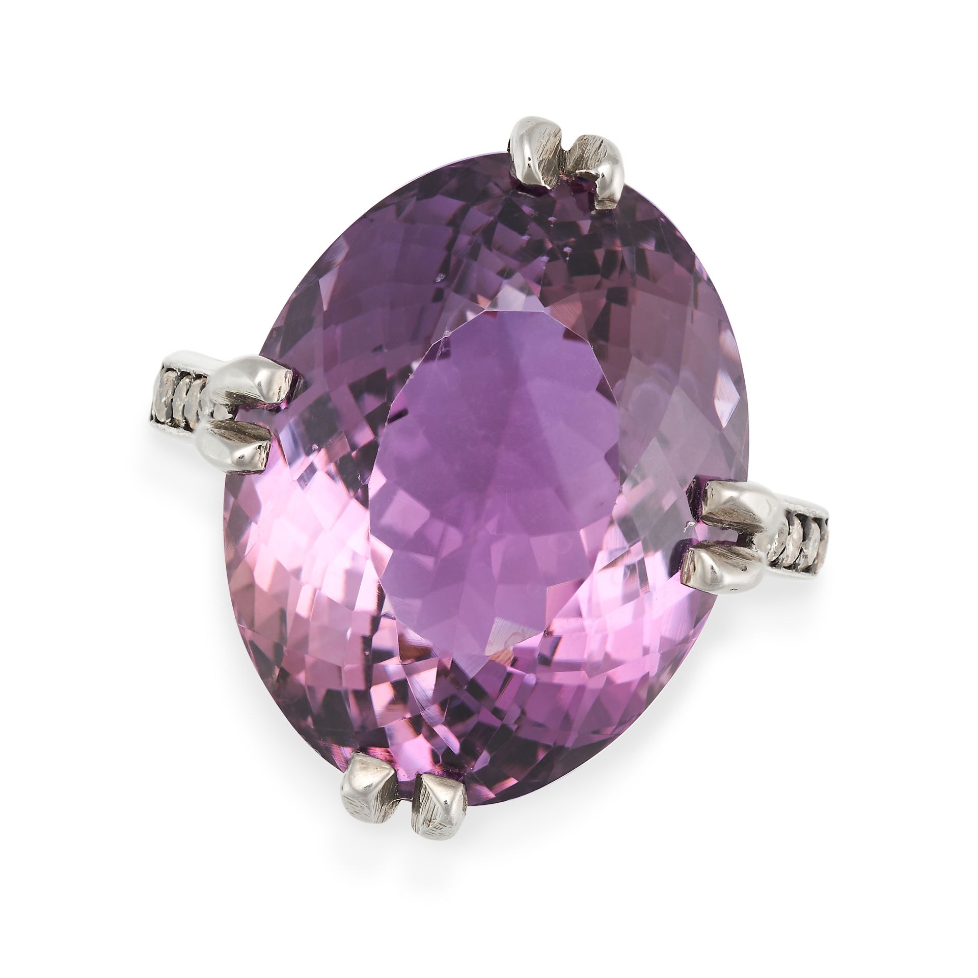 AN AMETHYST AND DIAMOND RING set with an oval cut amethyst accented by round cut diamonds, stampe...