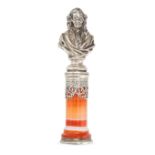 AN ANTIQUE SARDONYX AND SILVER BUST DESK SEAL comprising a polished sardonyx pillar surmounted by...