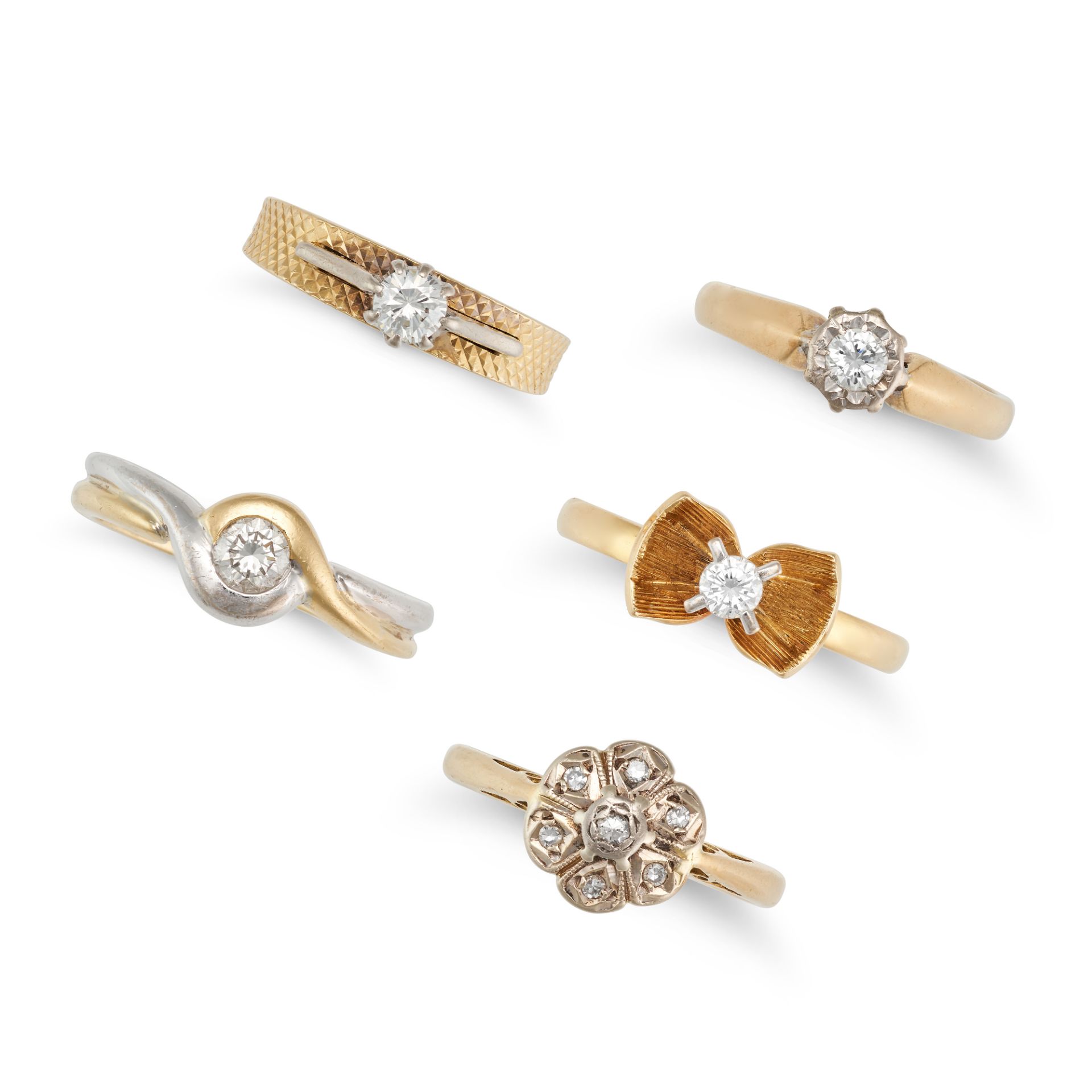 A COLLECTION OF DIAMOND RINGS comprising four solitaire diamond rings and one diamond cluster rin...