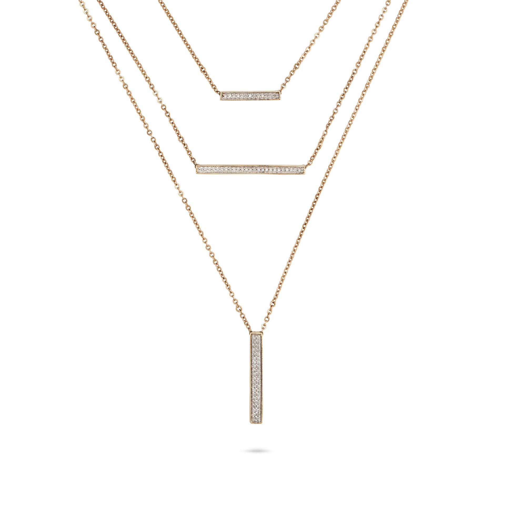 A DIAMOND AND EMERALD PENDANT NECKLACE comprising three rows of trace chain each with a bar set w...