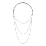 A PEARL SAUTOIR NECKLACE comprising a trace chain set with seed pearls, no assay marks, 150.0cm, ...