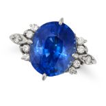 A SAPPHIRE AND DIAMOND RING set with an oval cut sapphire of 6.75 carats, the shoulders set with ...