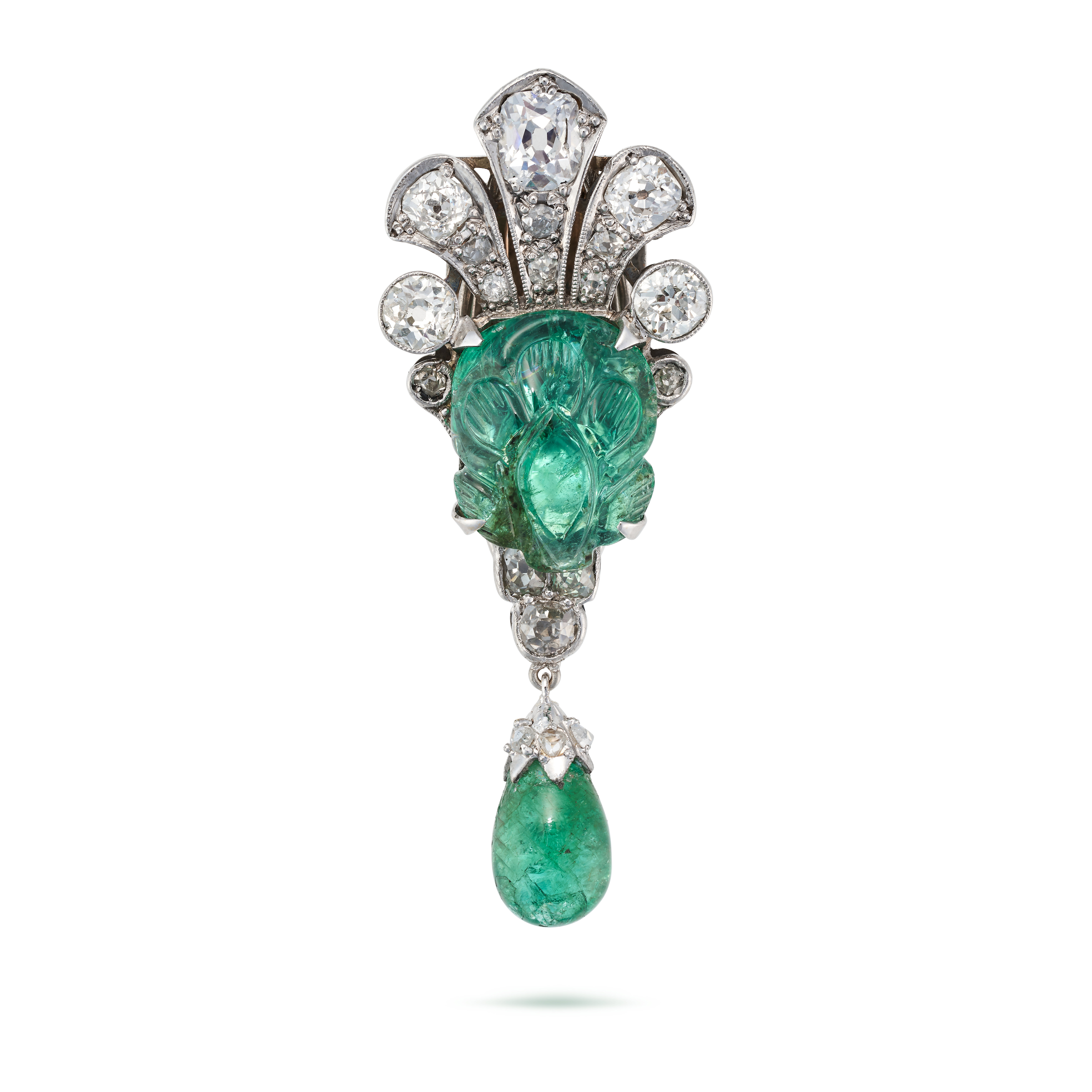 A MUGHAL CARVED EMERALD AND DIAMOND CLIP BROOCH set with a Mughal carved emerald accented by old ...