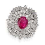 A RUBY AND DIAMOND CLUSTER RING in white gold, set with an oval cut ruby of approximately 1.23 ca...