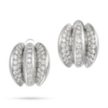 A PAIR OF DIAMOND EARRINGS each comprising three curved rows pave set with round brilliant cut di...