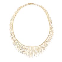 A MODERNIST GOLD BIB NECKLACE in 18ct yellow gold, the graduating necklace comprising abstract li...