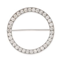 TIFFANY & CO., A DIAMOND CIRCLE BROOCH, 1940S in platinum, designed as an open circle set through...