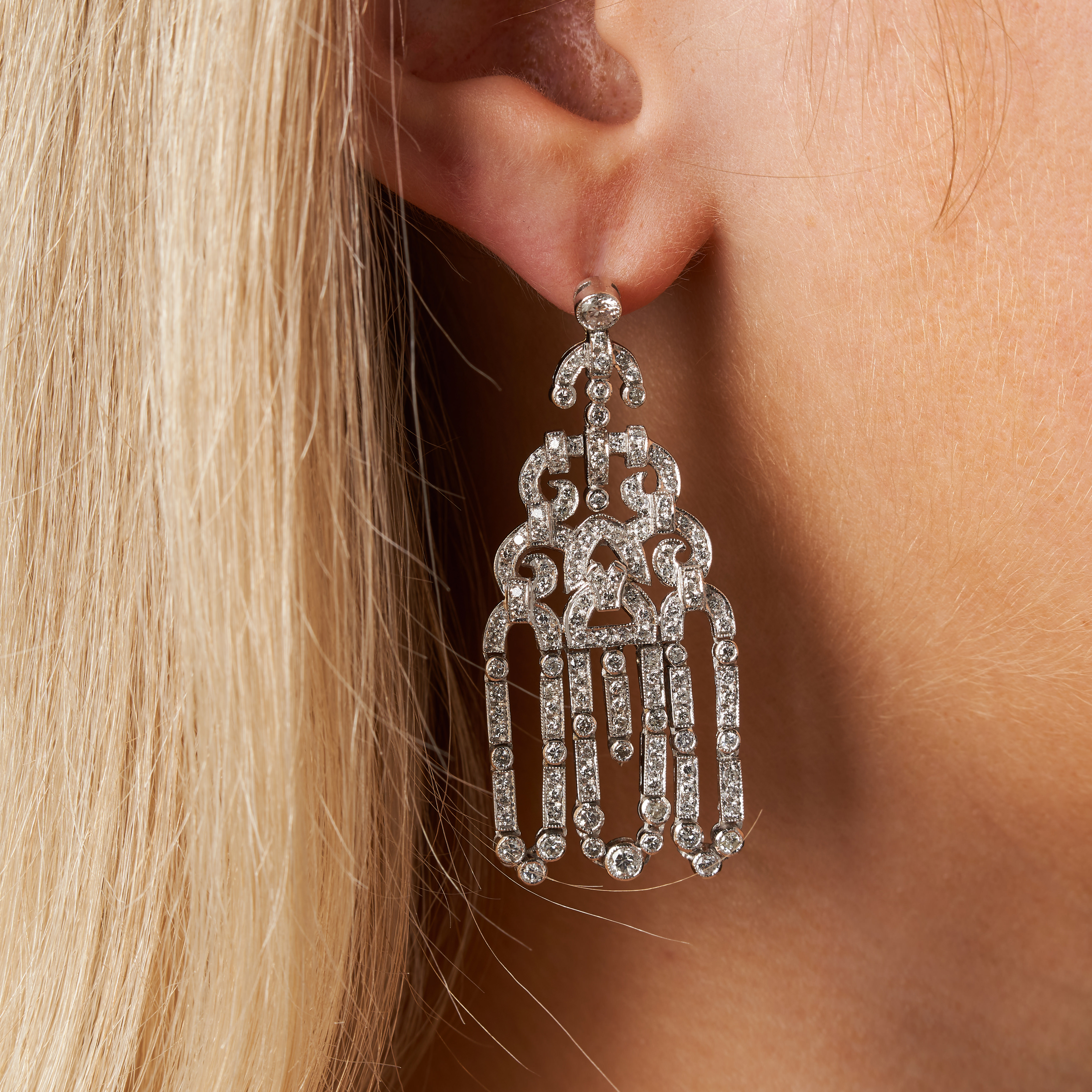 A PAIR OF DIAMOND CHANDELIER DROP EARRINGS each comprising scrolling links set throughout with ro... - Image 2 of 2