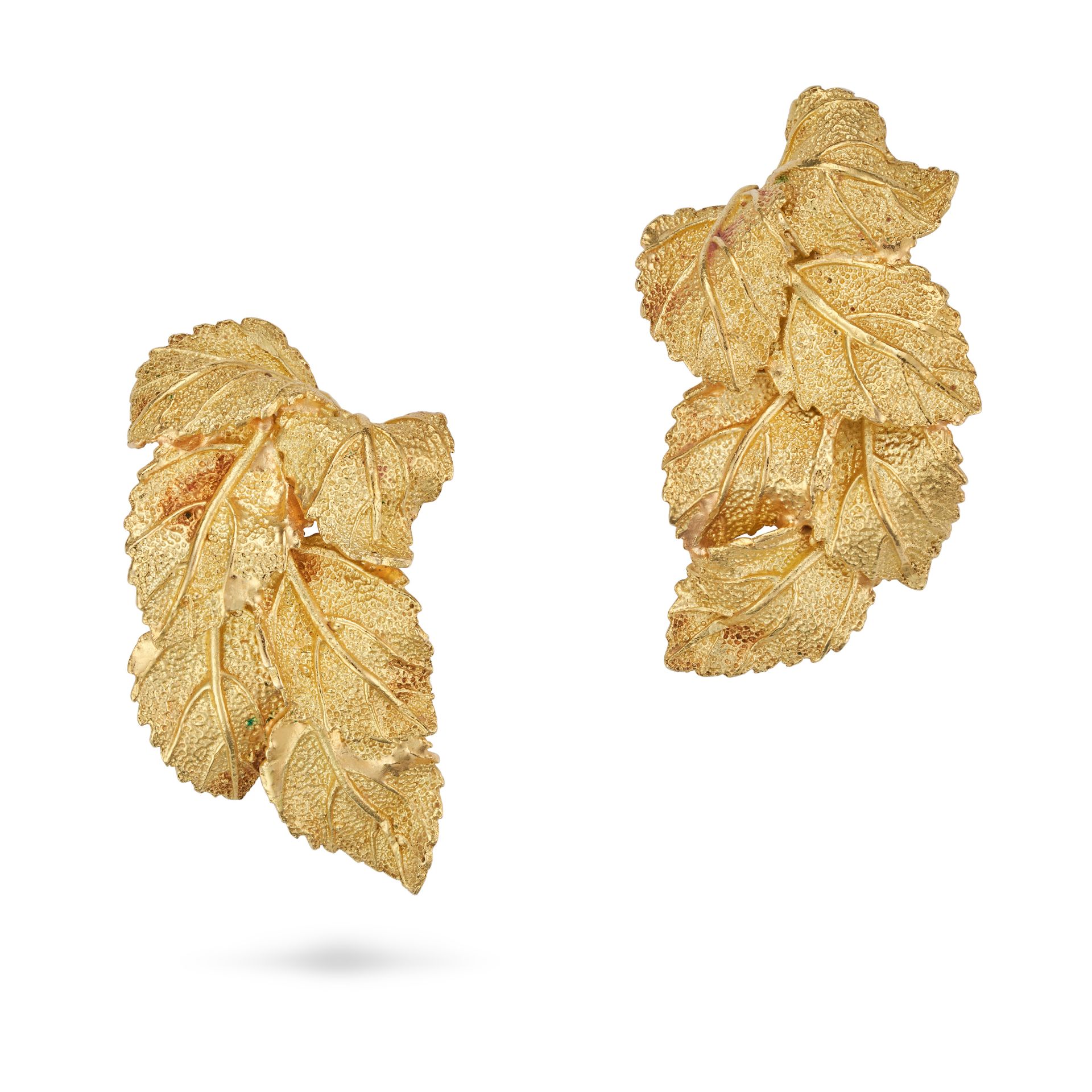 A PAIR OF LEAF EARRINGS in yellow gold, each designed as a spray of textured leaves, French impor...