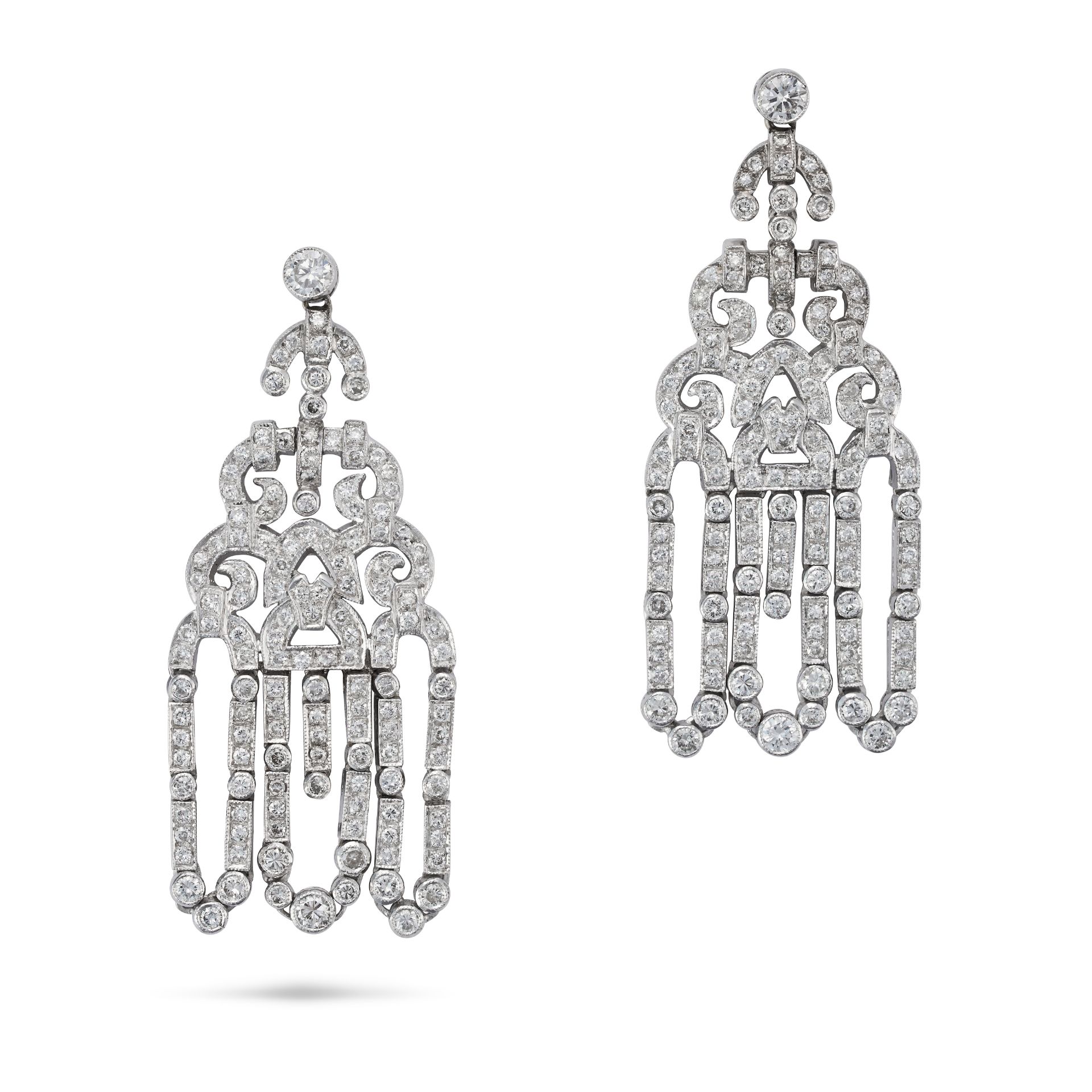 A PAIR OF DIAMOND CHANDELIER DROP EARRINGS each comprising scrolling links set throughout with ro...