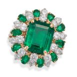 OSCAR HEYMAN, AN UNTREATED EMERALD AND DIAMOND RING / PENDANT set with an octagonal step cut emer...