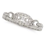 AN ART DECO DIAMOND BRACELET in platinum, the openwork bracelet set throughout with old and singl...