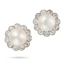 A PAIR OF NATURAL SALTWATER PEARL AND DIAMOND CLUSTER EARRINGS each set with a pearl of 9.4mm and...