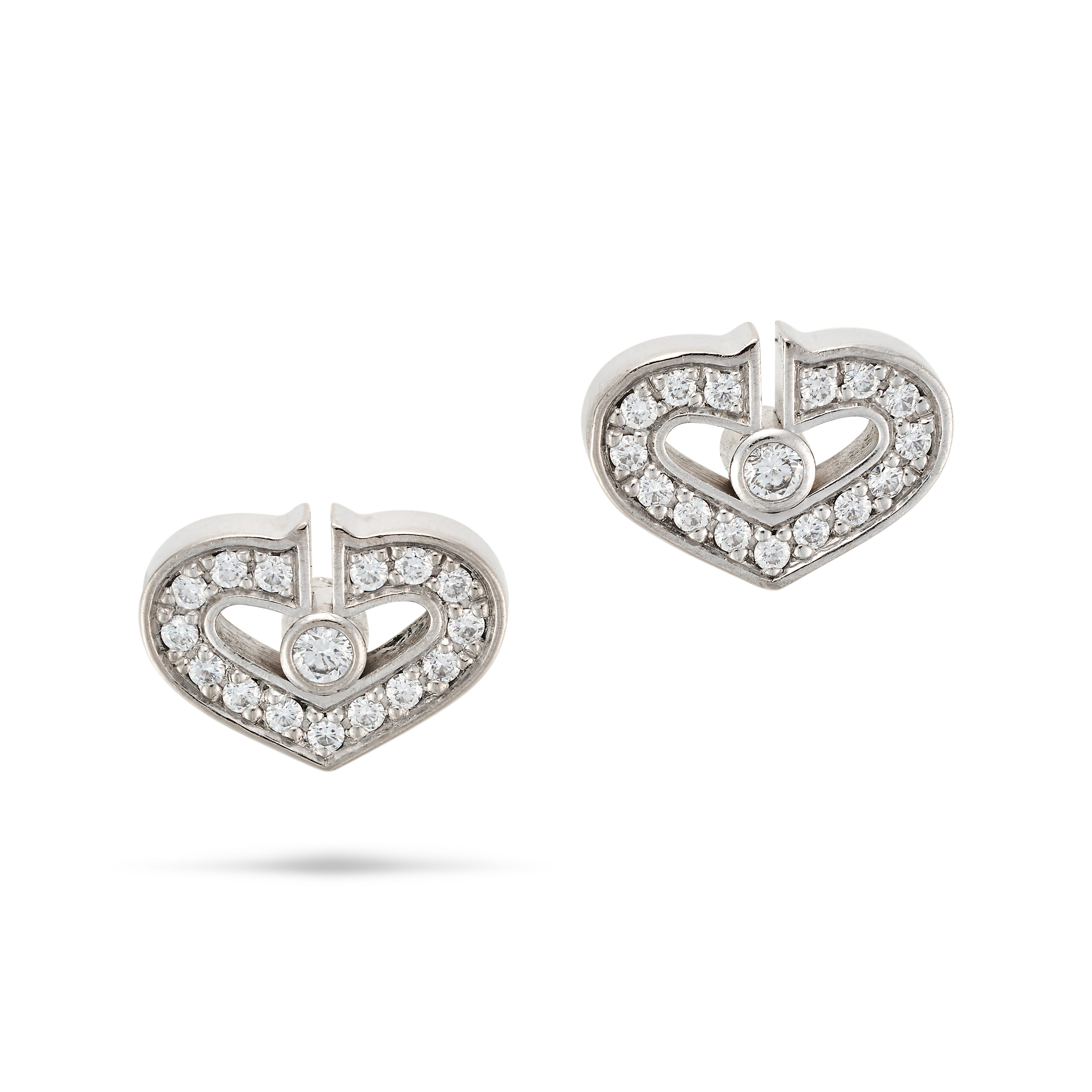 CARTIER, A PAIR OF DIAMOND C DE CARTIER HEART EARRINGS each designed as a CC motif forming a hear...