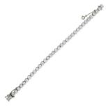 A FRENCH DIAMOND LINE BRACELET in 18ct white gold, comprising a row of round brilliant cut diamon...