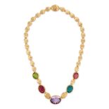 MARCO BICEGO, A MULTIGEM SIVIGLIA NECKLACE comprising a row of brushed links accented by oval cut...