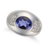 MAUBOUSSIN, AN IOLITE AND DIAMOND RING in 18ct white gold, set with a fancy cut iolite accented b...