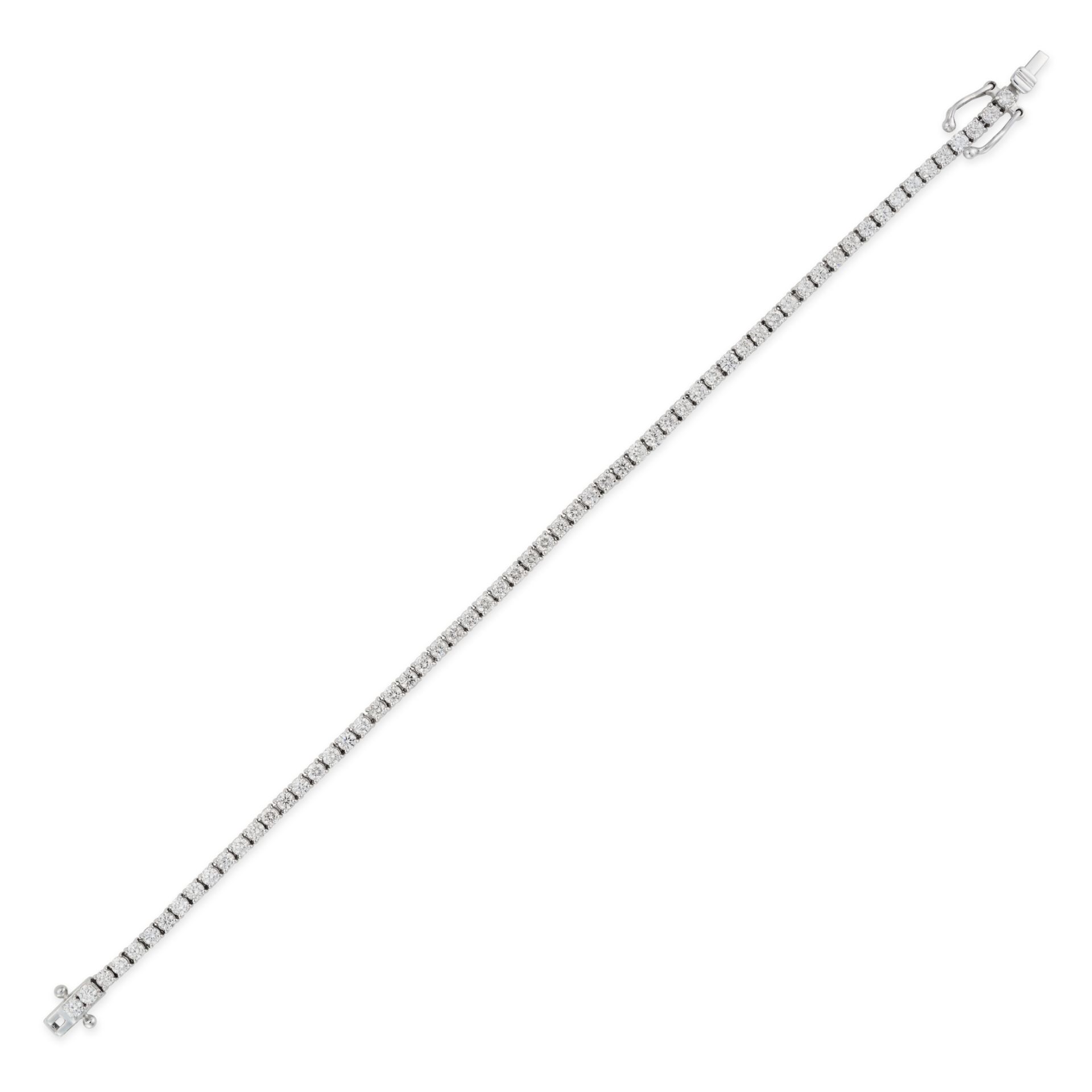 A 3.07 CARAT DIAMOND LINE BRACELET in 18ct white gold, set with a single row of round brilliant c...