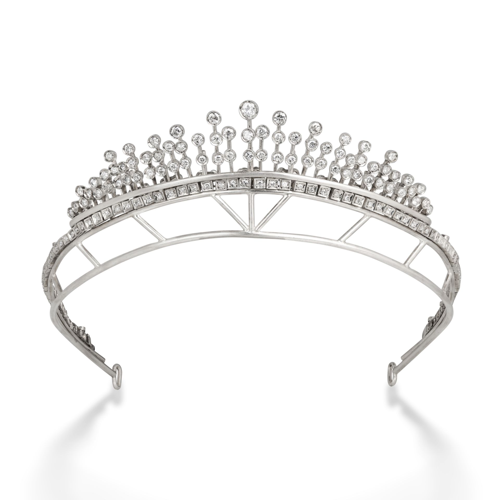 A DIAMOND FRINGE TIARA comprising a graduating row of fringes set with old and round cut diamonds...