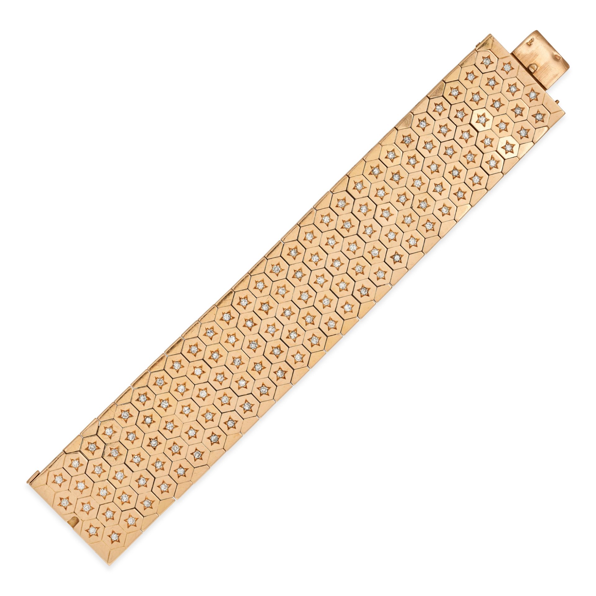 BOUCHERON, A VINTAGE DIAMOND HONEYCOMB BRACELET in 18ct yellow gold, comprising rows of hexagonal...