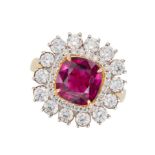 A 4.53 CARAT BURMA NO HEAT RUBY AND DIAMOND RING in 18ct yellow gold, set with a cushion cut ruby...