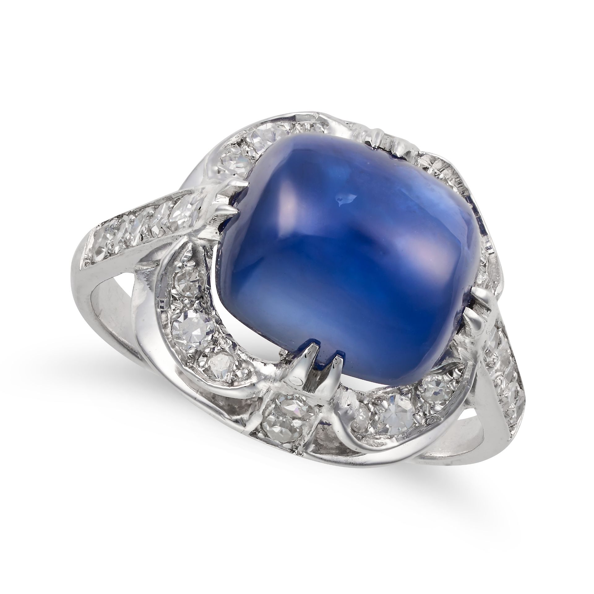 A SAPPHIRE AND DIAMOND RING set with a cabochon sapphire of approximately 8.60 carats, accented b...