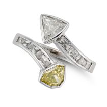 A FANCY INTENSE GREENISH YELLOW DIAMOND CROSSOVER RING set with a modified shield mixed cut fancy...