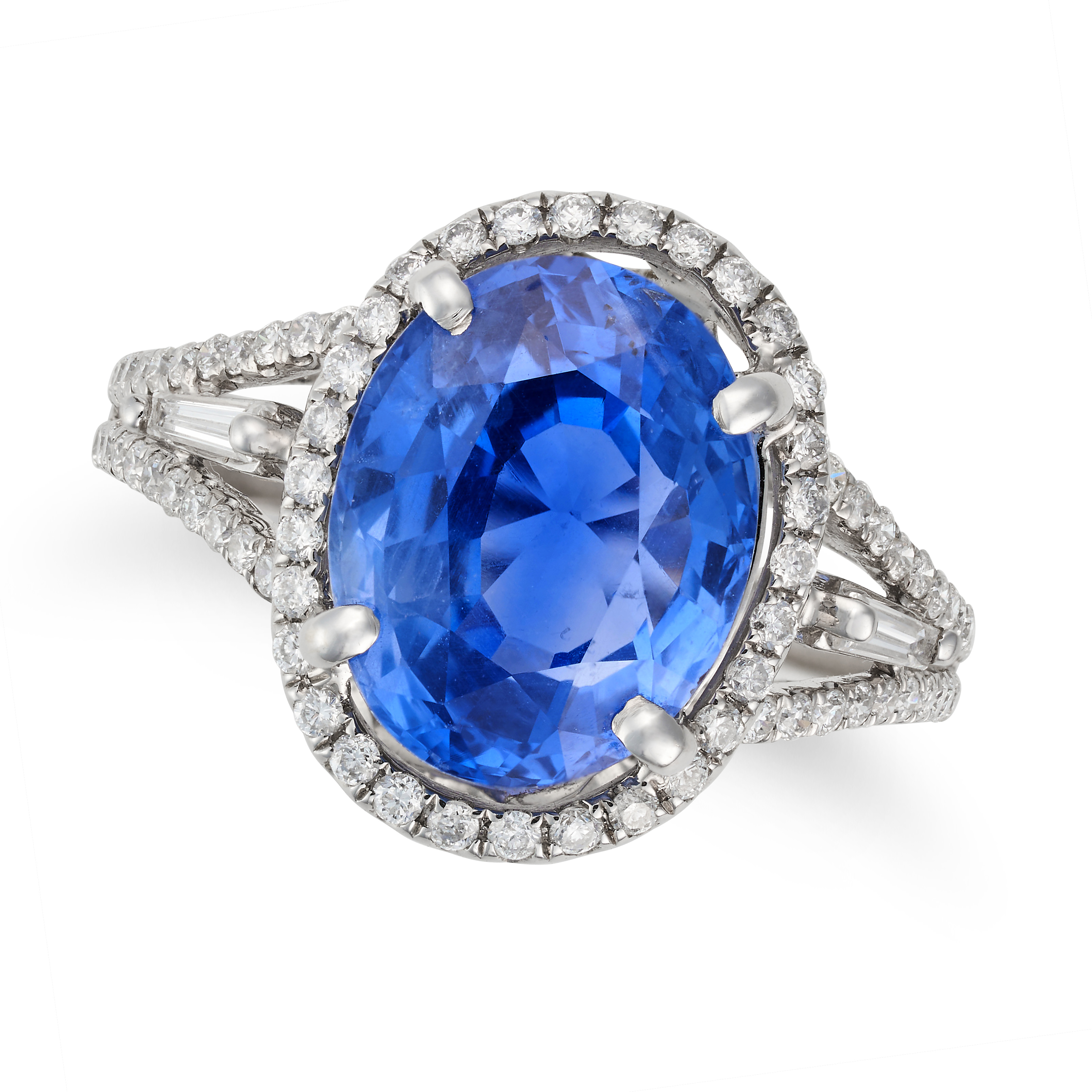 A FINE 7.12 CARAT CEYLON NO HEAT SAPPHIRE AND DIAMOND RING set with an oval cut sapphire of 7.12 ...