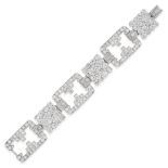 A FINE DIAMOND BRACELET comprising a row of openwork and geometric plaques, set throughout with r...