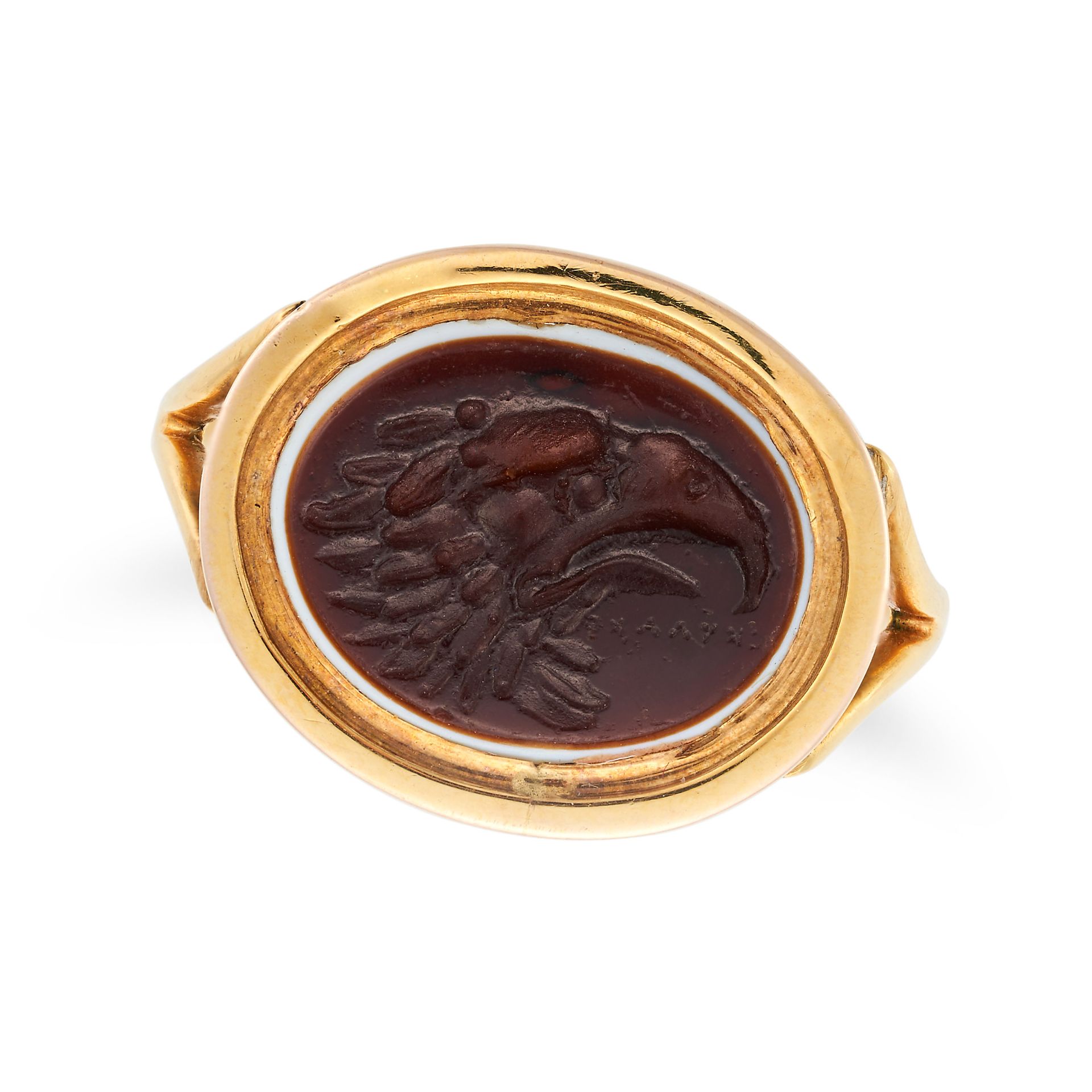 AN ANTIQUE BANDED AGATE INTAGLIO RING set with an oval banded agate intaglio carved to depict an ...