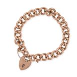 AN ANTIQUE PADLOCK BRACELET in 9ct yellow gold, comprising a curb link bracelet suspending a hear...