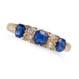 AN ANTIQUE EDWARDIAN SAPPHIRE AND DIAMOND RING in 18ct yellow gold, set with three cushion cut sa...