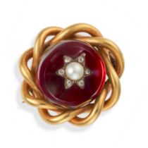 AN ANTIQUE GARNET, PEARL AND DIAMOND BROOCH set with a round cabochon garnet with an applied star...