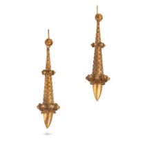 A PAIR OF ANTIQUE GOLD DROP EARRINGS in yellow gold, the textured tapering bodies accented by gol...