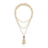 AN ANTIQUE SEED PEARL AND RUBY SAUTOIR NECKLACE comprising two strands of twisted seed pearls, su...