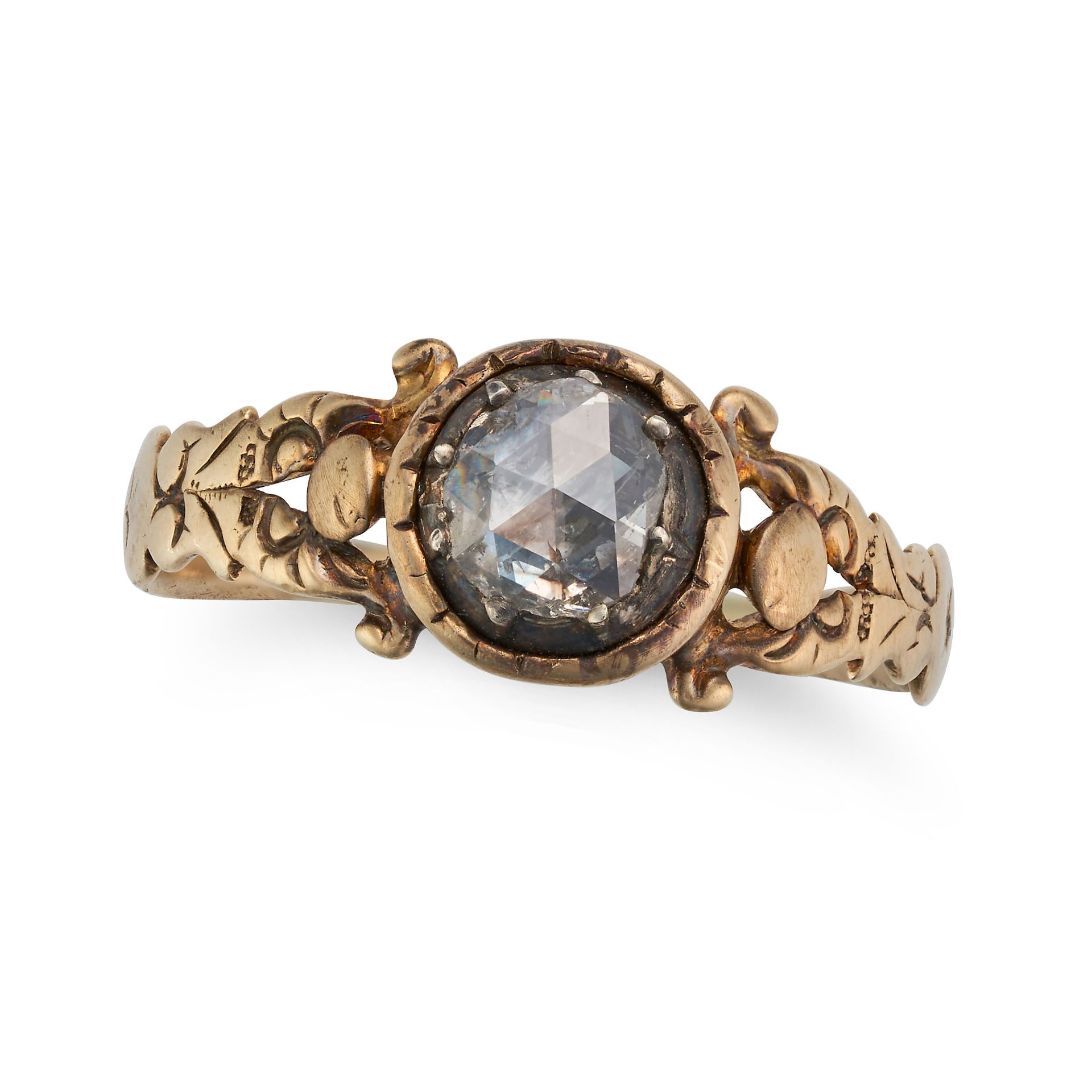 AN ANTIQUE DIAMOND RING in yellow gold and silver, set with a rose cut diamond, no assay marks, s...