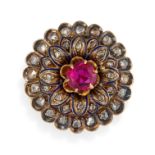 AN ANTIQUE SYNTHETIC RUBY, DIAMOND AND ENAMEL FLOWER RING in yellow gold, set with a round cut sy...