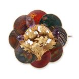 AN AMETHYST AND SCOTTISH HARDSTONE THISTLE BROOCH / PENDANT designed as a sprig of thistle set wi...