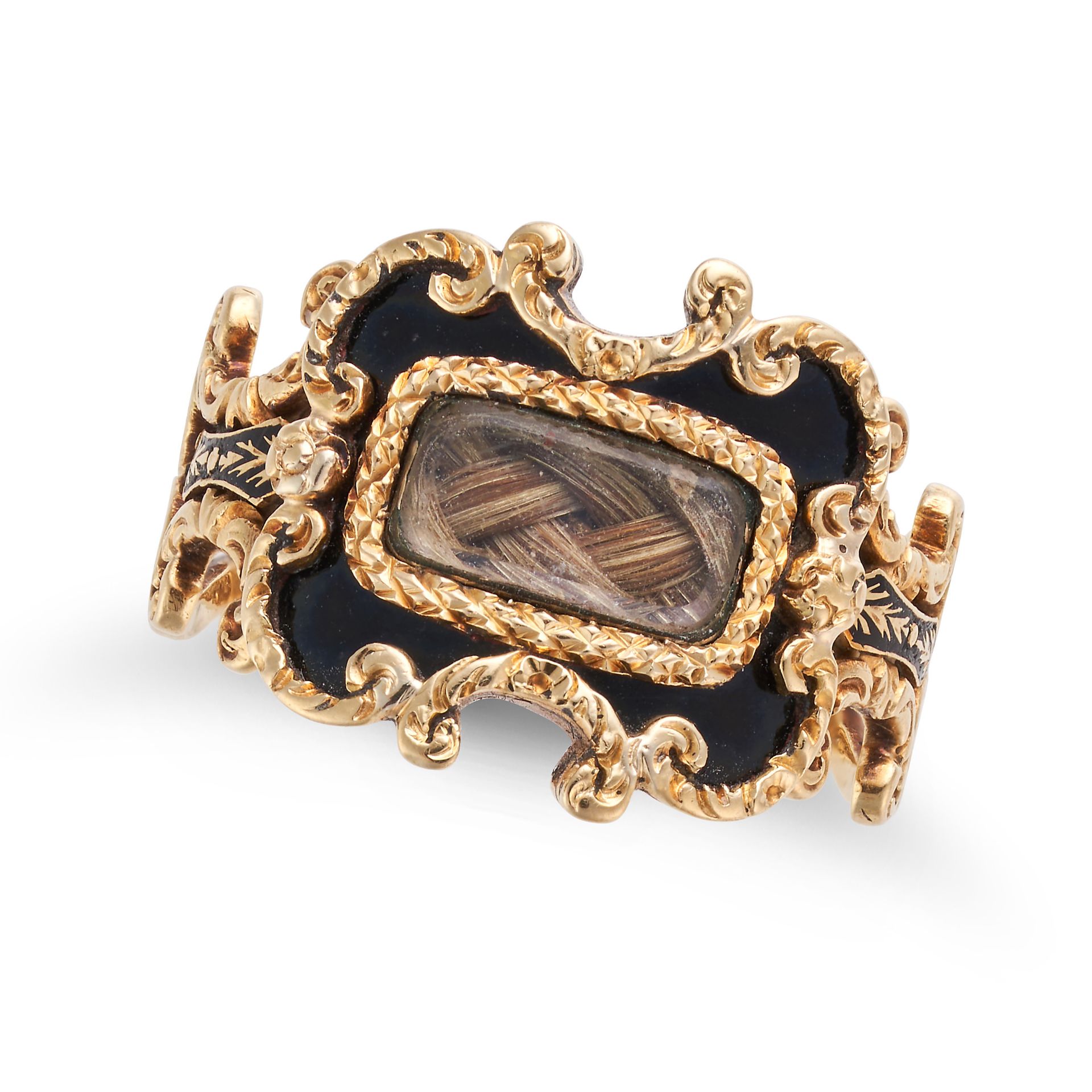AN ANTIQUE ENAMEL AND HAIRWORK MOURNING RING in 18ct yellow gold, set with a glass covered locket...