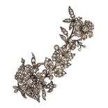 AN ANTIQUE DIAMOND EN TREMBLANT BROOCH in yellow gold, designed as a spray of foliage set through...