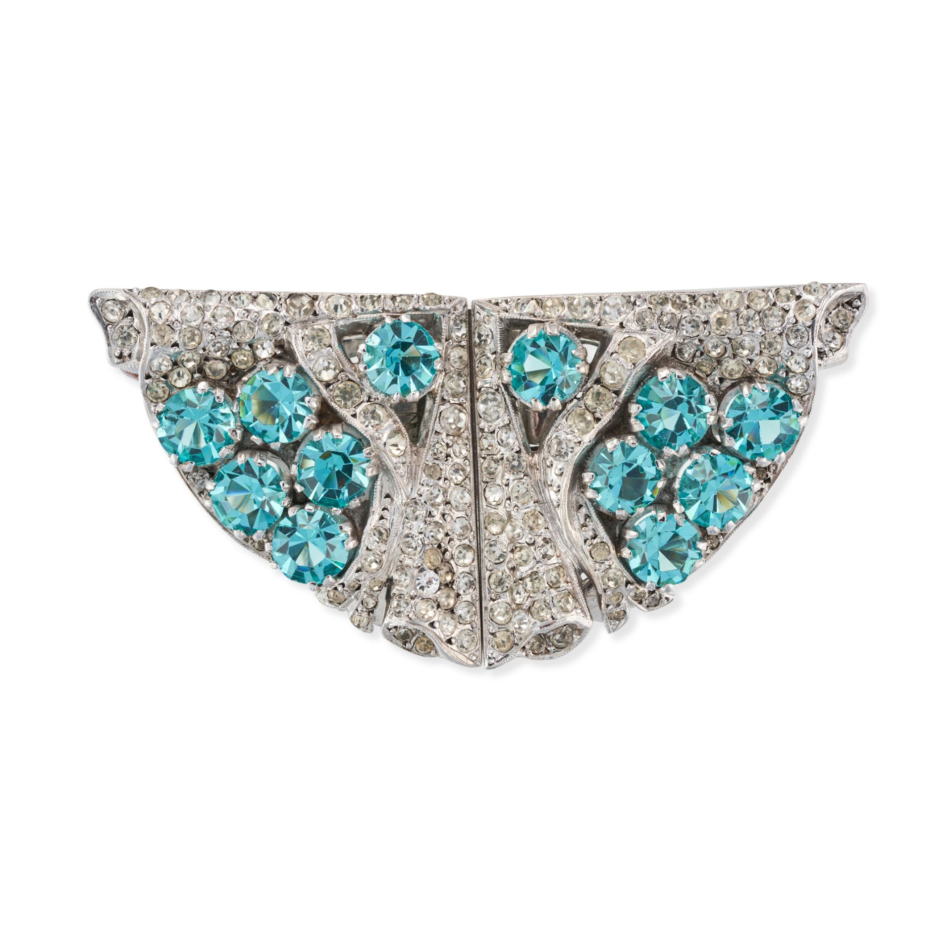 A BLUE ZIRCON AND PASTE DOUBLE CLIP BROOCH the scrolling brooch set throughout with round cut blu...