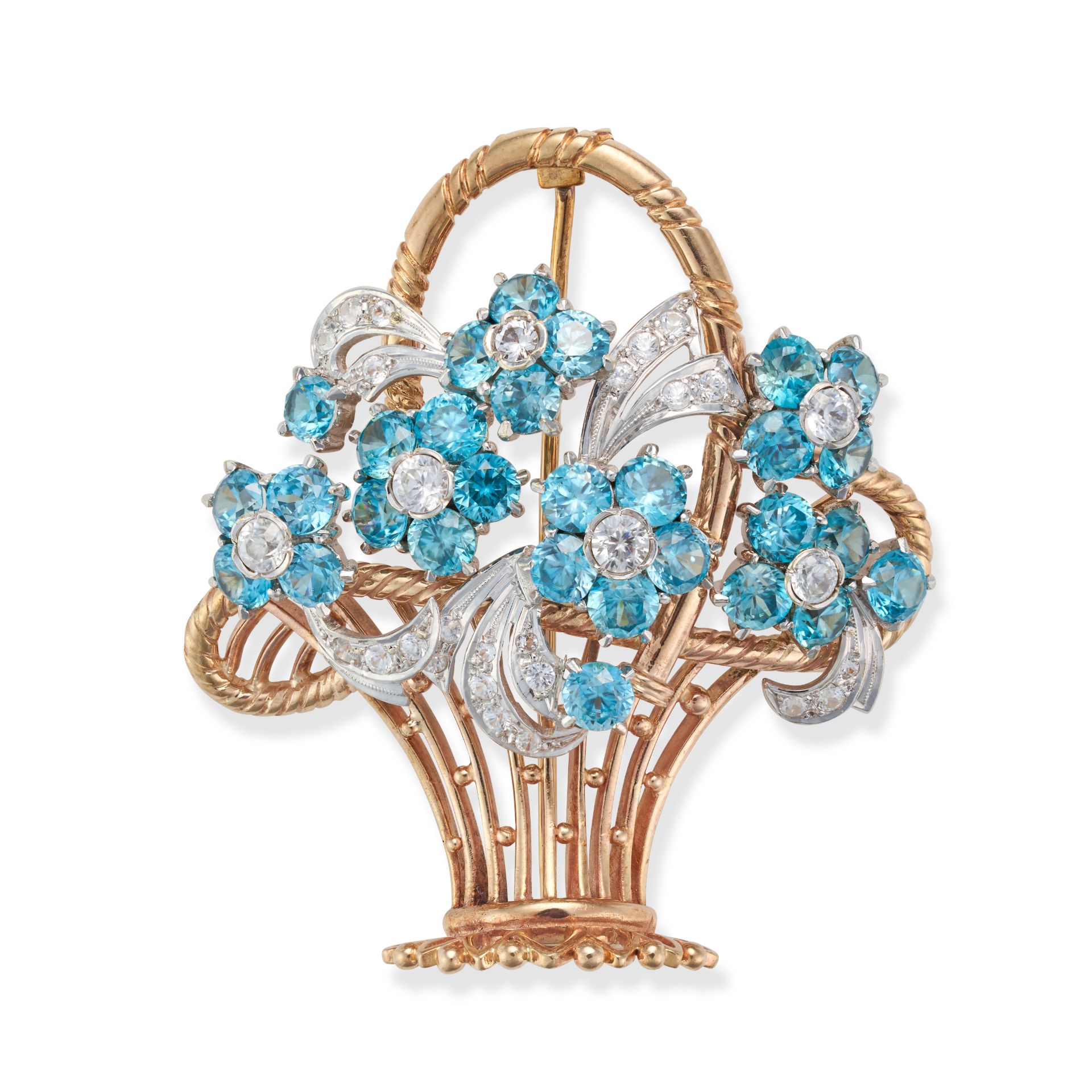 A RETRO BLUE ZIRCON AND DIAMOND FLOWER BASKET BROOCH in 9ct