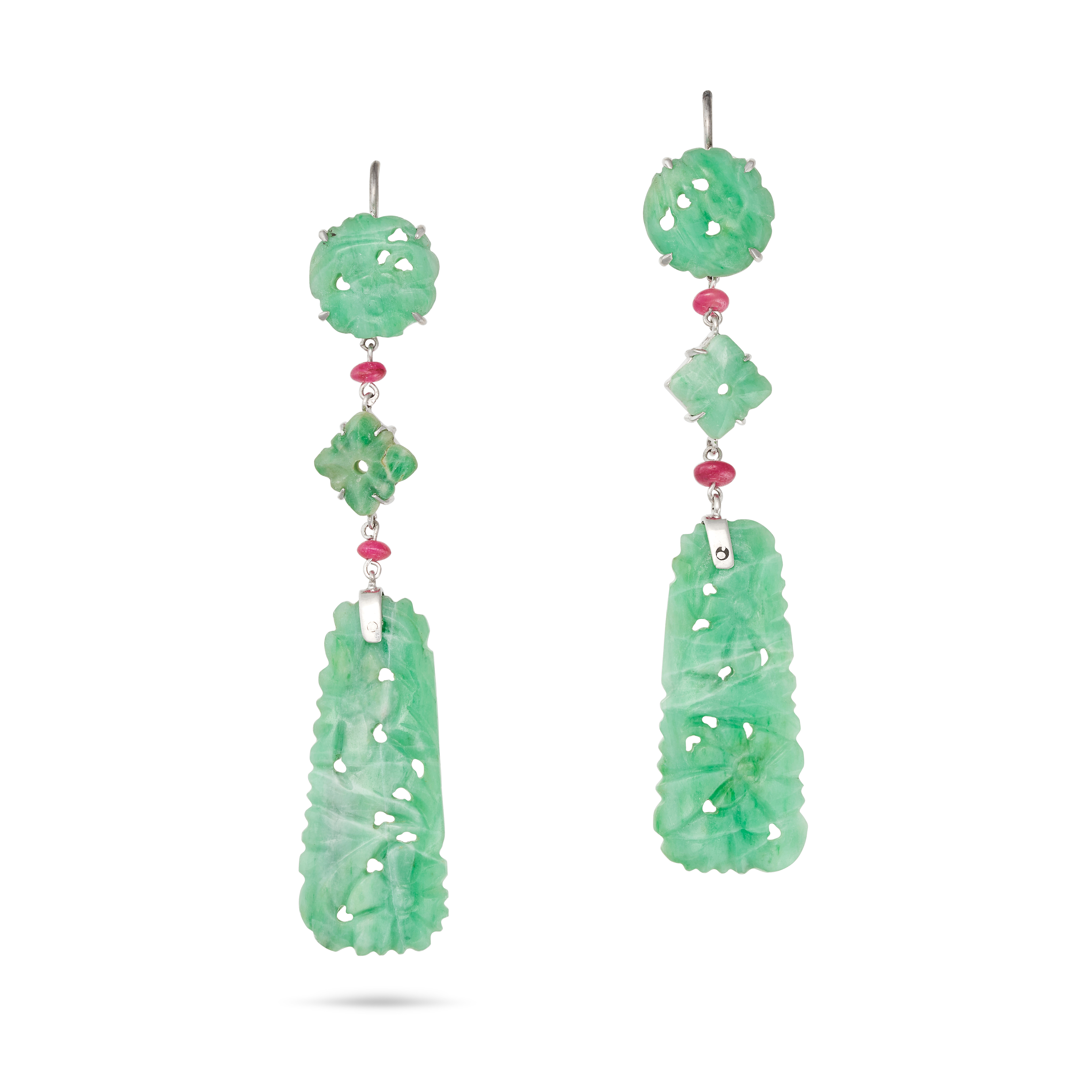 A PAIR OF JADEITE JADE AND RUBY DROP EARRINGS in white gold, each comprising two carved jadeite j...