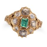 AN ANTIQUE EMERALD AND DIAMOND CLUSTER RING in yellow gold, set with a cushion cut emerald in a c...