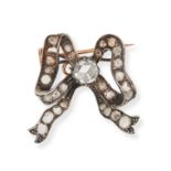 AN ANTIQUE DIAMOND BOW BROOCH in yellow gold and silver, designed as a bow set throughout with ro...