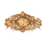 AN ANTIQUE TOPAZ BROOCH in yellow gold, the cannetille style brooch set with three oval cut yello...