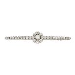 A FINE ANTIQUE NATURAL SALTWATER PEARL AND DIAMOND BAR BROOCH in white gold, set with a pearl of ...