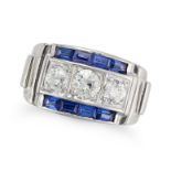 A DIAMOND AND SAPPHIRE RING, CIRCA 1940 set with three old European cut diamonds, accented on eac...